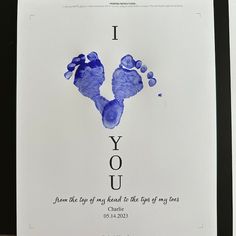 a blue hand and foot print with the words i love you