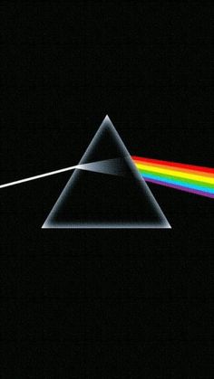 the dark side of the moon with a rainbow in it