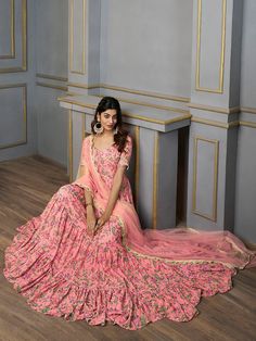 Colour: pinkFloral printedRound neckShort, regular sleevesAnarkali shape with regular styleSequinned detailAnkle length with flared hemMachine weave regular georgette Fitted Georgette Choli With Printed Motifs, Pink Georgette Lehenga With Printed Motifs, Pink Georgette Sharara With Sheer Dupatta, Bollywood Style Pink Dresses With Printed Motifs, Pink Bollywood Dresses With Printed Motifs, Eid Pink Sharara With Printed Motifs, Bollywood Style Pink Printed Dresses, Pink Unstitched Lehenga With Printed Motifs, Pink Georgette Anarkali Set With Printed Motifs