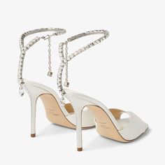 SAEDA SANDAL 100 | Ivory Satin Sandals with Crystal Embellishment | Spring 2023 collection | JIMMY CHOO Jimmy Choo Saeda, Evening Heels, Satin Sandals, Crystal Sandals, Wedding Dress Shoes, Strap Sandals Women, Embellished Sandals, Crystal Chain, Gorgeous Shoes