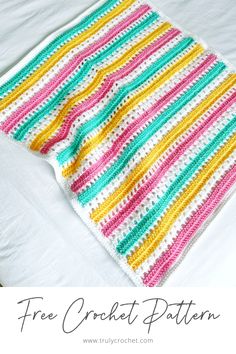 a crocheted blanket on top of a bed with text overlay that reads quick to view delightful free crochet pattern