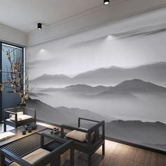 a living room with a large painting on the wall