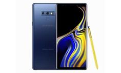 the new samsung note9 is next to a yellow pen