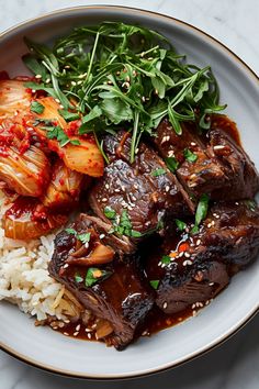 a white plate topped with meat and rice