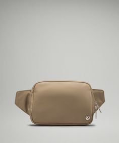 Casual Lululemon Bag With Cell Phone Pocket, Lululemon Bags With Pockets For Everyday Use, Lululemon Casual Rectangular Bag, Casual Rectangular Lululemon Bag, Casual Lululemon Bags For Daily Use, Everyday Casual Lululemon Bags, Casual Everyday Lululemon Bags, Lululemon Crossbody Bag With Cell Phone Pocket, Lululemon Travel Pouch Bag