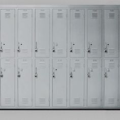 a bunch of lockers are lined up against the wall