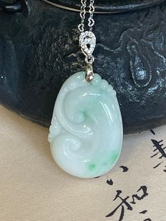 Elegant Jadeite Ruyi Pendant with S925 Clasp & Chain Ruyi is a symbol and words for everything goes as you wish. It's a good luck symbol!  These are very high quality, smooth with vitreous surface! One is light lavender color and another is milky color mixed with splash of green in it.   Immerse yourself in the allure of this meticulously carved Jadeite Ruyi pendant. With its smooth contours and traditional symbolism, the Ruyi represents good fortune, power, and authority in Chinese culture. Thi Power And Authority, Rose Quartz Bracelet Beads, Luck Symbol, Good Luck Symbols, Light Lavender, Rose Quartz Beads, Jade Jewelry, Lavender Color, Quartz Bracelet