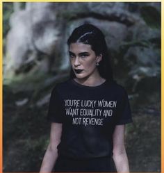 a woman wearing a t - shirt that says you're lucky women want follity and not reverse