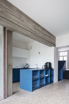 the kitchen is clean and ready to be used as a dining room or office space