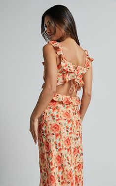 Alessa Midi Dress - V Neck Frill Detail Empire Waist Back Cut Out Dress in Peach Floral Orange Backless Dress For Spring, Spring Orange Backless Dress, Chic Apricot Mini Dress For Summer, Chic Apricot Dress For Summer, Summer Party Mini Dress With Open Neckline, Apricot Sleeveless Mini Dress For Party, Orange Backless Mini Dress For Spring, Spring Orange Backless Mini Dress, Apricot V-neck Party Dress