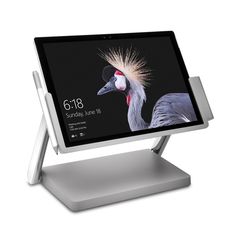 an image of a desktop computer with a bird on it's display screen and dock