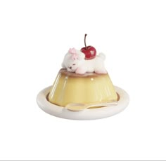 a small white dog sitting on top of a cake covered in icing and a cherry