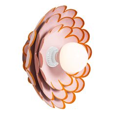 an orange and white flower shaped light fixture