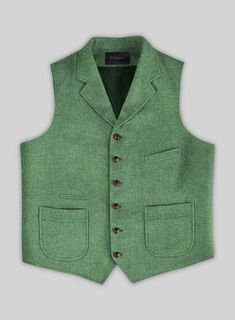 Strive for a sublime sophistication that enriches our Highlander Heavy Paris Green Tweed Hunting Vest. In addition, crafted from pure wool cloth, which possesses the unique ability to be versatile with a solid green finish. Plus, hit the sweet spot between the functional and ceremonial with the addition of this suave piece to your stellar collection.  The Hunting Vest was inspired and worn by the British and American in the late 19th century and early 20th century. In order to keep warm when hun Tailored Green Tweed Jacket For Business, Elegant Green Tweed Jacket With Welt Pockets, Fitted Green Tweed Jacket With Welt Pockets, Fitted Green Tweed Jacket For Winter, Tailored Green Tweed Jacket With Welt Pockets, Green Tweed Jacket With Welt Pockets For Business, Green Tweed Jacket For Winter Workwear, Green Tweed Jacket For Workwear In Winter, Green Tweed Jacket For Winter