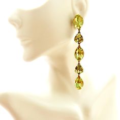 Long Yellow Rhinestone Dangle Earrings, Yellow Jewel Long Pierced Earrings, Jeweled Showgirl Earrings As the sun sets on a warm summer day, casting a golden hue over the horizon, these Long Yellow Rhinestone Dangle Earrings are the epitome of elegance. With a cascade of yellow jewels that dance delicately with each movement, these earrings are a true showstopper. Imagine wearing them to a glamorous gala, the soft glow of the evening lights reflecting off the rhinestones, making you the center of Sun Sets, The Horizon, Pierced Earrings, Summer Day, Earings Piercings, Favorite Jewelry, Jewelry Earrings Dangle, Etsy Earrings, Dangle Drop Earrings