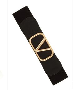 Add some pizazz to a dress or shirt with this Stretch Belt for women. Adorned with a V belt buckle and vegan leather this belt will enhance your figure and bring a bit of style to your outfit- night or day. About me One Size fits most- 25"- 37" 2.5” elastic band Buckle closure Four hole adjustable fit Luxury Formal Belt With Metal Pin Buckle, Designer Belt Buckles With Gold-tone Hardware For Formal Wear, Edgy Black Belt Buckle With Removable Belt, Designer Belt With Gold-tone Hardware And Rectangular Buckle, Luxury Black Belt Buckles With Gold-tone Hardware, Outfit Night, Belt For Women, Stretch Belt, Belts For Women