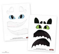 two paper cut outs with eyes and fangs on them