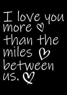 the words i love you more than the miles between us 2 and 3 are written in white ink on a black background