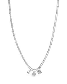 This lovely link necklace has a sparkling center -- three CZ charms! You'll want to wear this chic piece all the time, and it easily works for both day and night looks. Available in gold and silver tones. Materials: 14K gold ﻿or﻿﻿ rhodium plated brass, cubic zirconia Features: Measures 16" with 2" extender, Lead & Nickel free, lobster clasp Everyday Silver Cubic Zirconia Chain Necklace, Silver Cubic Zirconia Chain Necklace, Elegant Silver Charm Necklace With Double Chain, Elegant Silver Charm Necklaces With Double Chain, Elegant Silver Double Chain Charm Necklace, Silver Cubic Zirconia Necklace With Paperclip Chain, Silver Cubic Zirconia Jewelry With Paperclip Chain, Silver Jewelry With Cubic Zirconia Paperclip Chain, Elegant Silver Chain Link Charm Necklace