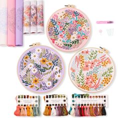 the embroidery kit includes four different designs and thread