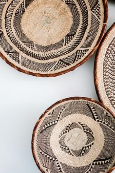 three woven baskets sitting on top of each other