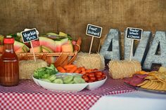 a table topped with lots of different types of vegetables and fruit on top of it