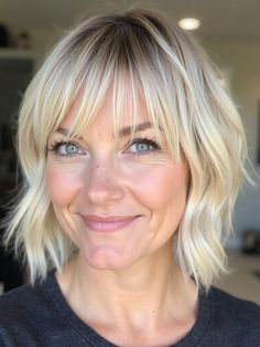 This layered shag with fringe is designed to add volume and texture to fine blonde hair. The light, airy layers create movement, while the wispy fringe softly frames the face. The blonde tones add a sun-kissed glow, making this cut perfect for those who want a low-maintenance yet stylish look. This is a great option for those with finer hair who want to achieve a fuller, more dynamic style. Shag Haircut With Fringe, Shag With Fringe, Layered Shag With Fringe, Fine Blonde Hair, Layered Shag Haircut, Haircuts With Fringe, Haircut With Fringe, Fringe Ideas, Wispy Fringe