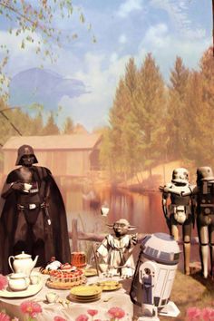 star wars characters are sitting at a picnic table with food and drinks in front of them