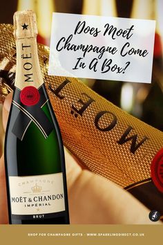 a bottle of champagne being held up by someone's hand with a sign that says, does not champagne come in a box?