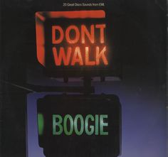 a neon sign that says don't walk and boogie