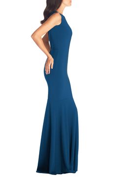 Be the star of any show in a gorgeous evening gown with a demure neckline and a figure-enhancing silhouette that flares out into a dramatic mermaid skirt. 62" length Back zip closure Jewel neck Sleeveless Floor-length mermaid skirt Lined 92% polyester, 8% spandex Hand wash, line dry Imported Women's Clothing Floor-length Gown With Flattering Silhouette For Evening, Mermaid Hem Dress With Back Opening, Fishtail Evening Dress With Back Opening, Flattering Silhouette Prom Evening Dress, Formal Stretch Mermaid Floor-length Dress, Elegant Mermaid Silhouette Gala Dress, Elegant Blue Fishtail Evening Dress, Floor-length Mermaid Dress With Back Opening For Gala, Stretch Mermaid Dress With Sweep Train