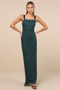 Timeless beauty is easy to achieve with a sophisticated updo and the Lulus Classy Flirtation Emerald Green Lace Bustier Maxi Dress! Chic green floral lace shapes this exquisite dress features a bustier-inspired bodice with internal boning across the front and a straight, lacy neckline, all supported by wide adjustable straps. The high, fitted waist tops a column maxi skirt that falls to a scalloped, eyelash lace hem. Convenient kick pleat and hidden zipper/clasp at the back. Fit: This garment fits true to size. Length: Floor length. Size medium measures 53" from adjustable straps to hem. Bust: Great for any cup size. Waist: Fitted - very fitted at natural waist. Hip: Loosely Fitted. Undergarments: May be worn with a strapless bra, adhesive bra, petals, or no bra. Fabric: Fabric has no stre Sophisticated Updo, Green Wedding Guest Dresses, Emerald Green Lace, Formal Dresses Gowns, Green Bridesmaid Dresses, Lace Bustier, Adhesive Bra, Column Dress, Green Prom Dress