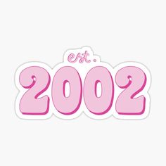 pink sticker with the words et 2002 in it's letters and numbers