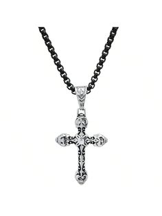 This gorgeously detailed cross pendant is both sleek and sophisticated, with a worn-in look to resemble a long-treasured piece of jewelry.  The pendant has ornate vintage like details which the oxidized plating accentuates. Wear it alone or layer with one of our other single chain necklaces for a layered look.
KEY DETAILS: 

Rounded Box Style Chain


Black Ion + Oxidized Stainless Steel


Hypoallergenic, Waterproof, & Sweatproof

Your order comes in a sleek magnetic box, enclosed in a luxe velve Gothic Cross Necklace With Oxidized Finish, Gothic Oxidized Cross Necklace, Oxidized Cross Pendant Necklace, Antique Silver Cross Jewelry With Oxidized Finish, Oxidized Metal Cross Pendant Jewelry, Antique Silver Oxidized Cross Necklace, Antique Silver Cross Necklace With Oxidized Finish, Cross Necklace Mens, Detailed Cross