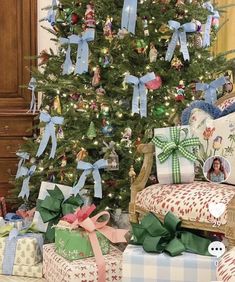 a christmas tree with presents under it