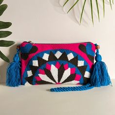 Description: Classic Multicolor Handwoven Shoulder Bag Brand New! This Boho Bag Was 100% Hand Knit By Wayuu Women But Designed By Us. The Wayuu Are An Indigenous Community In Colombia Known For Their Beautiful Handwoven Work, And This Bag Represents About A Week's Worth Of Work. Details: Handmade Item - Handwoven Color: Pink, Blue, White, & Black Materials: Nylon, Cotton Dimensions: 10.5"W X 6.5" L Total Length: 25.5" Style: Boho Chic/ Retro/ Hippie Chic/ Classic Summer Everyday Knitted Clutch Bag, Knitted Clutch Bag For Everyday Use, Knitted Pouch Bag, Multicolor Woven Clutch Bag, Indie Bag, Hand Knit Bag, Trendy Boho, Boho Bag, Hippie Chic