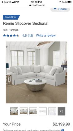 a white sectional sofa on sale for $ 1, 599 in the furniture store