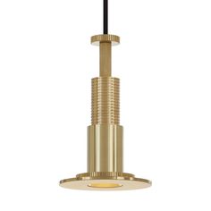 a brass colored light fixture with a black cord hanging from the ceiling and a white background