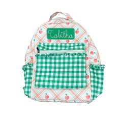 Get ready to turn heads with the Peaches Plaid Ruffle Backpack! Sweeten up your school style with this girly accessory. Keep your belongings organized and make a statement at the same time. Perfect for the playful and stylish student. Large exterior pocket 2 exterior side pockets Large inside pocket Full size: 16 x 13 x 3.5 Care Instructions: Hand wash Spot Clean Lay flat to dry Green School Backpack With Pockets, Cute School Backpack With Pockets, Green Preppy School Bag, Cute Green Backpack For Students, Cute Green Student Backpack, Cute Green Backpack For Back To School, Preppy Backpack For Daily Use, Trendy Bags For End Of School Year Events, Trendy Backpack For School Events