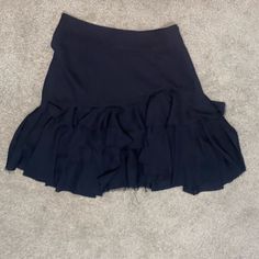 Never Worn Waist Size 24 00-0 Black Flowy Skirt Black Asymmetrical Lined Skort, Black Asymmetrical Pleated Skort, Black Pleated Asymmetrical Skort, Black Relaxed Fit Tiered Skort, Black Tiered Skirt For Workwear, Black Tiered Skirt For Work, Black Tiered Skort, Black Flared Skort With Ruffled Detail, Chic Black Flowy Skort