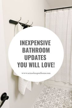 a white bathroom with the words expensive bathroom updates you will love