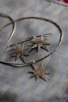 Christmas Star Thai Silver Hook Earring (E0089) Silver Brass Jewelry With Star Charm, Nickel-free Star-shaped Metal Earrings, Silver Star-shaped Sterling Silver Earrings, Silver Star-shaped Brass Jewelry, Nickel-free Sterling Silver Star Hoop Earrings, Bohemian Silver Star-shaped Earrings, Star Earring, Star Pendant Necklace, Silver Earrings Handmade