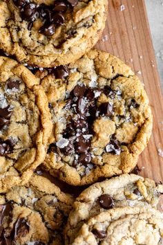 chocolate chip cookies on a wooden cutting board