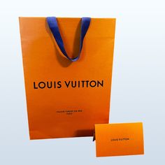 This Authentic Empty Louis Vuitton Orange Heavy-Duty Paper Tote Gift Bag Is Ready For Gift Giving. Authentic Bag Size: 14.25” X 8.75” X 4.5” Comes With Matching Receipt Holder Blue Fabric Handles Brand New. Excellent Condition Without Defects. No Stains Or Rips. Louis Vuitton Orange Shopping Bag, Gift Paper Bag, Louis Vuitton Orange, Receipt Holder, Authentic Bags, Gift Paper, Shopping Tote, Gift Giving, Blue Fabric