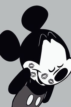 an image of mickey mouse with his eyes closed and mouth wide open, on a gray background