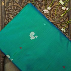 Persian Green Handwoven Pure Katan Silk Banarasi Peacock Kadwa Fabric - Khinkhwab Traditional Unstitched Saree Blouse Embroidered Fabric, Traditional Blue Handloom Fabric, Wedding Traditional Wear With Peacock Design In Raw Silk, Unstitched Motif Fabric For Puja, Festive Raw Silk Traditional Wear With Peacock Design, Traditional Paithani Silk Blouse Piece With Traditional Patterns, Paithani Silk Blouse With Motifs For Traditional Ceremonies, Paithani Silk Blouse Piece With Motifs For Eid, Tussar Silk Traditional Wear With Peacock Design For Wedding