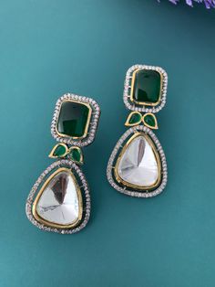 Top quality uncut kundan earring with American diamond work and monalisa top. About 2.5 inch long, push back and super light weight . Emerald Earrings For Wedding And Festivals, Green Kundan Jewelry With Matching Earrings, Green Emerald Earrings For Festivals, Emerald Green Earrings For Festivals, Green Danglers With Stone Work For Party, Party Green Danglers With Stone Work, Elegant Green Kundan Chandelier Earrings, Kundan Jeweled Earrings For Diwali, Traditional Green Dual-tone Earrings