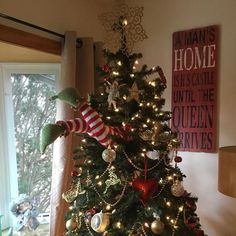 a decorated christmas tree in a living room