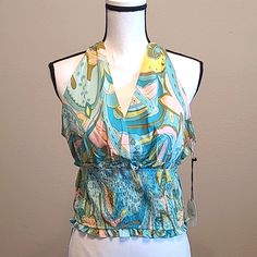 Cute Summer Halter Sexy Top. Women Large. Green, Yellow, Pink, Turquoise Color Swirls. New Wth Tags. I Have Many More Items Like This & In This Size In My Other Listings. Check Out My Closet!! Get A Discount On A Multiple (More Than 1 Item) Purchase & Pay Only 1 Price On Shipping! Fitted Multicolor V-neck Halter Top, Feminine Fitted Multicolor Tops, Fitted Feminine Multicolor Tops, Chic Multicolor Fitted Halter Top, Summer Halter Neck Top For Party, Flirty Camisole Top For Vacation, Multicolor Halter Neck Top For Party, Flirty Fitted Tops For Beach, Flirty Fitted Top For The Beach