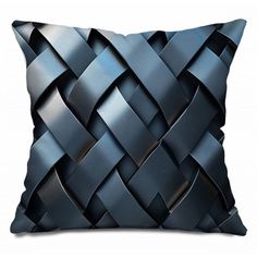 a black pillow with an intricate design on it